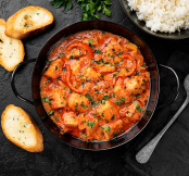 Peixe assado com molho de tomate (Imagem: Nelea Reazanteva | Adobe Stock)